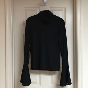 Stretchy, knit turtleneck with bell sleeves